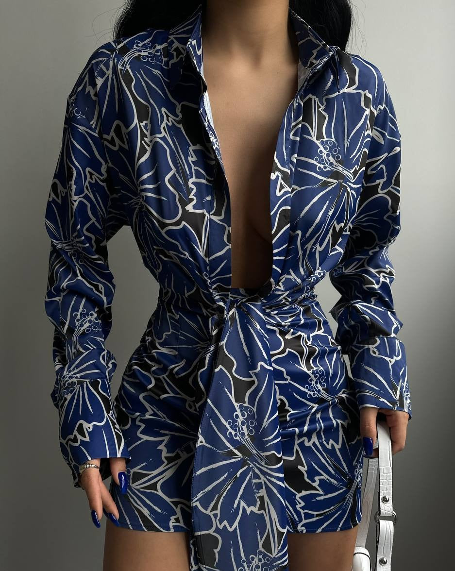 Model showcasing the chic and comfortable Serene Blue Blossom Bound Mini Dress with elegant long sleeves