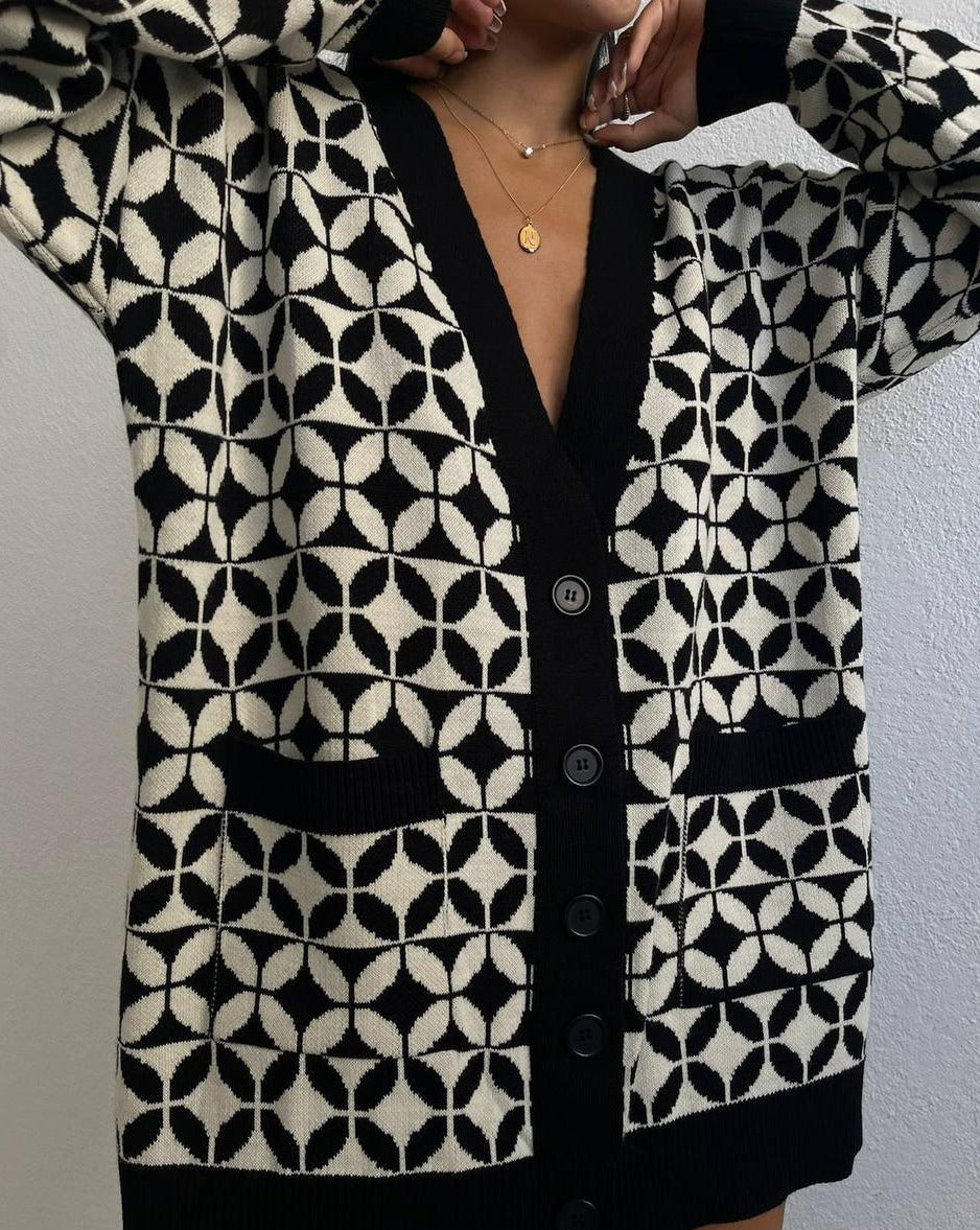 Front view of the Kail Jacquard Knit Cardigan, showcasing its front button closure and versatile V-neck style
