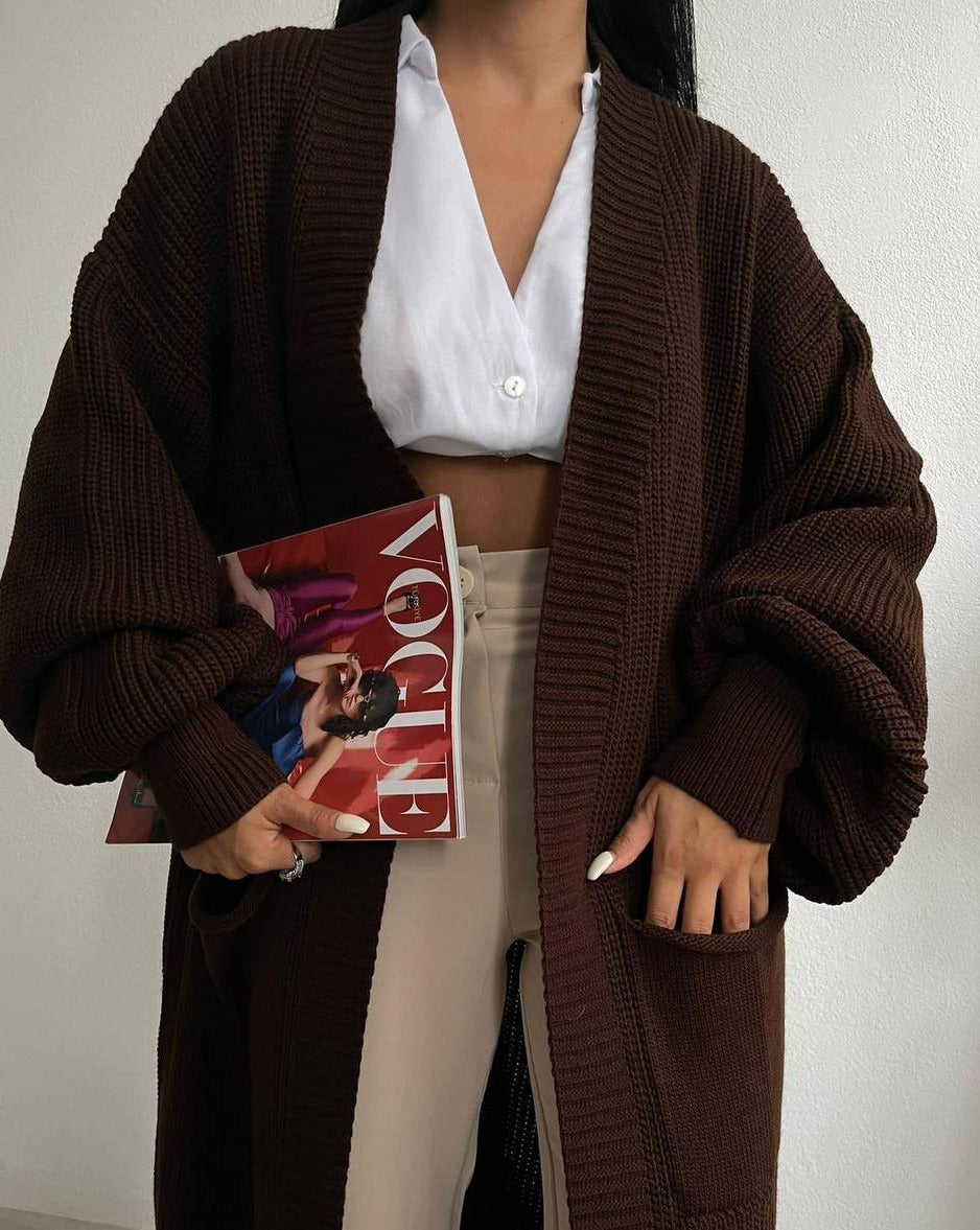 Stay cozy and stylish in the Marlow Cardigan, featuring an oversized fit and unique balloon sleeves.