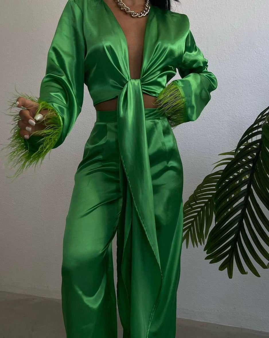 Stylish green Ferlayne crop top with luxurious feather sleeve accents