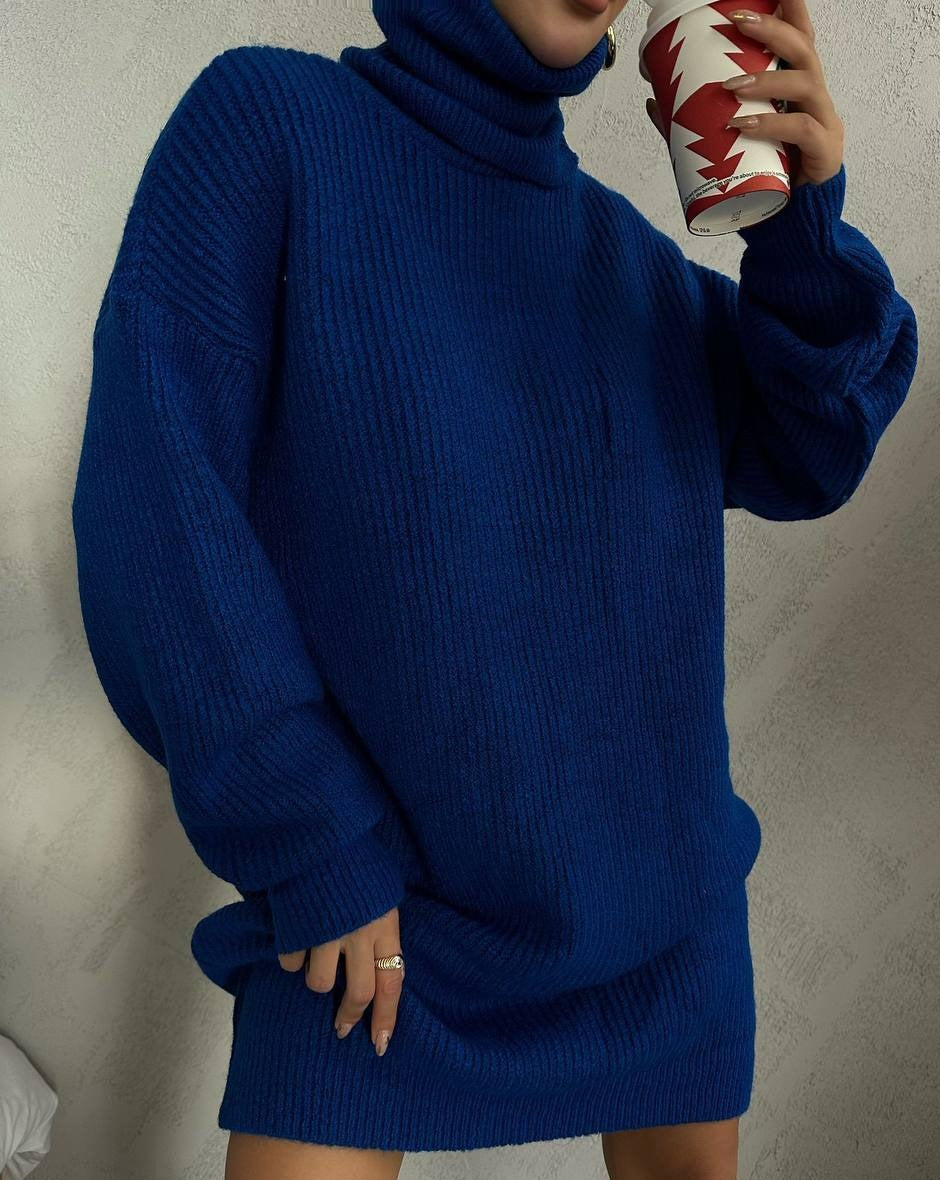 Kai oversized sweater dress in a cozy midweight knit fabric. Features a stylish turtle neck and long sleeves. Perfect for any fall occasion