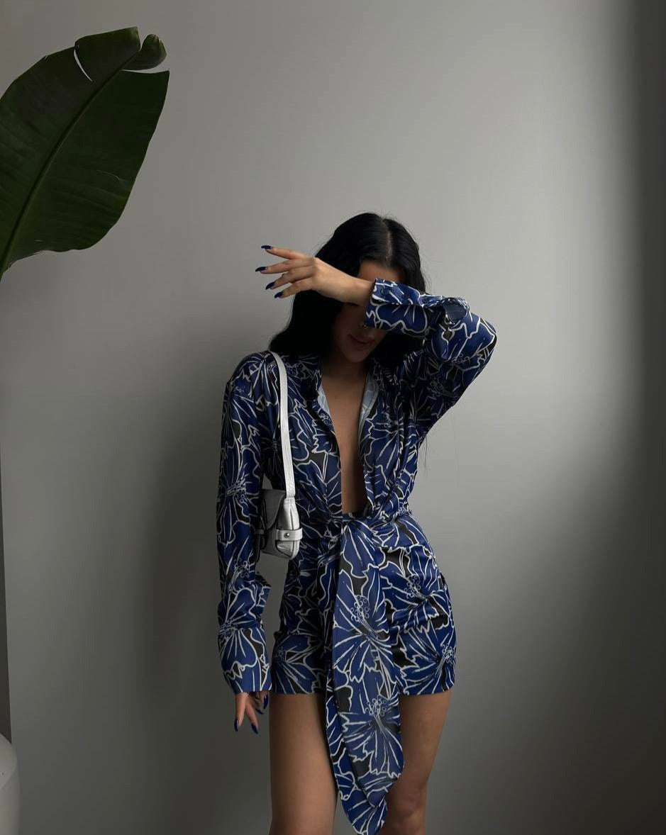 Serene Blue Blossom Bound Mini Dress with an enchanting blue and white floral print and center front tie