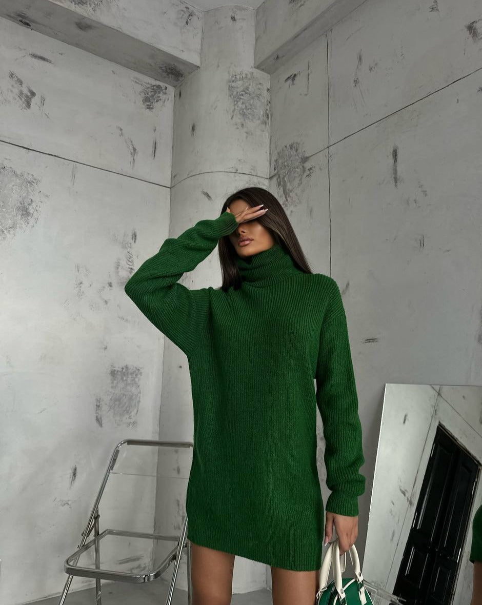 Front perspective of Kai Green Turtleneck Sweater Tunic Mini Dress, presenting the elegant turtleneck and fresh green hue, exclusively at Mutu shop.
