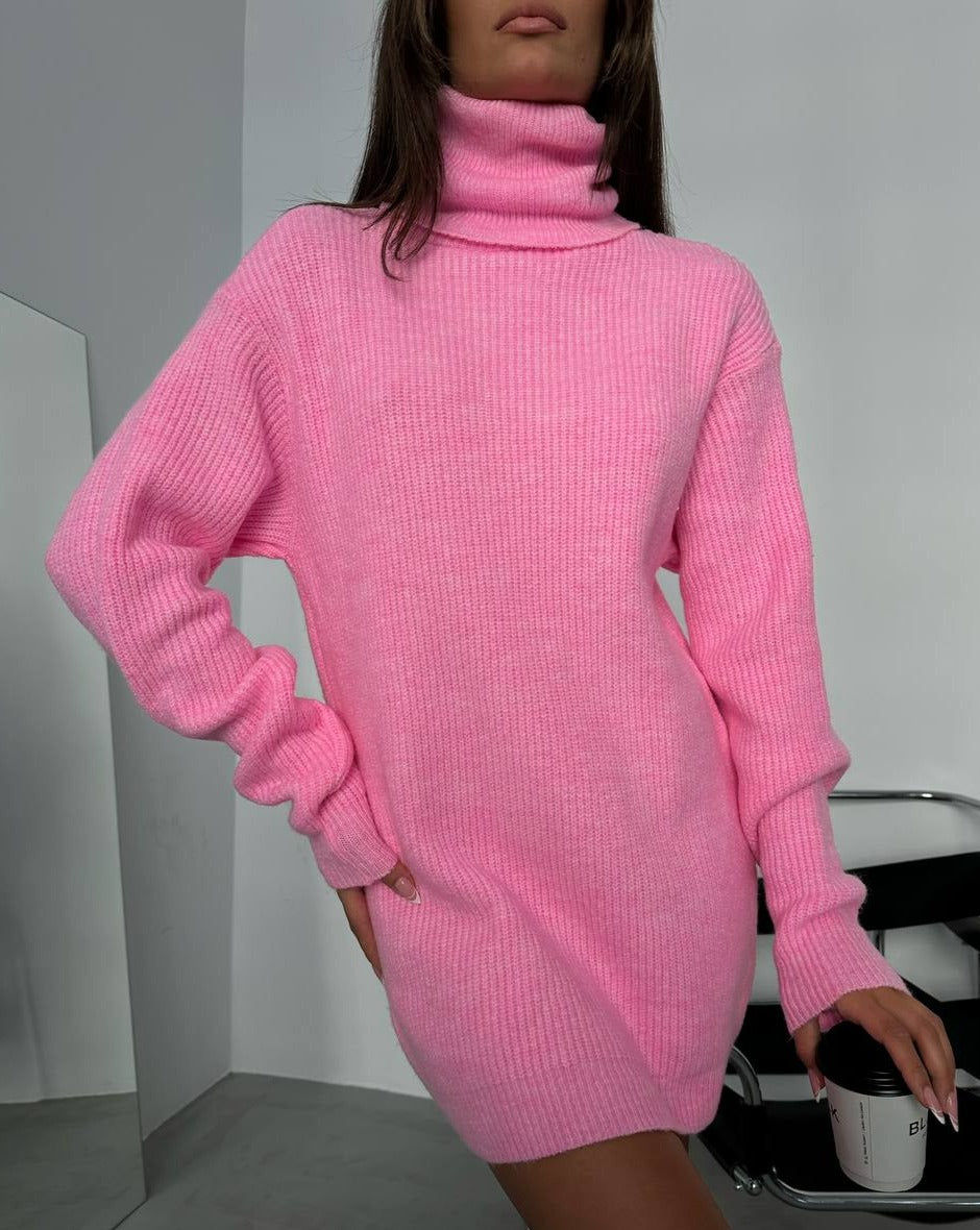 Detail view of the Kai Pink Turtleneck Sweater Tunic Mini Dress, highlighting the quality craftsmanship and material, available at Mutu shop.