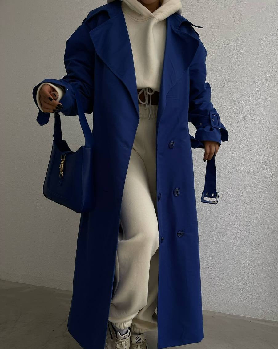 Front view of the elegant Mutu Aisha Blue Trench Coat, exemplifying the 2023 ladylike fashion trend.