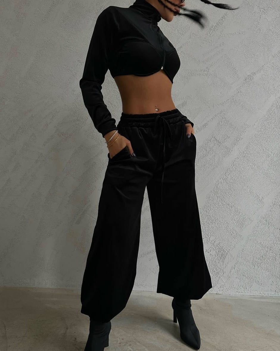 Black velvet tracksuit set with cropped jacket and wide-leg pants