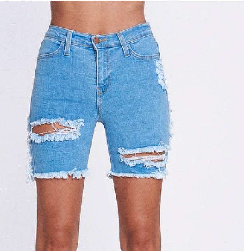 Light stone distressed Bermuda shorts with a bermuda length.