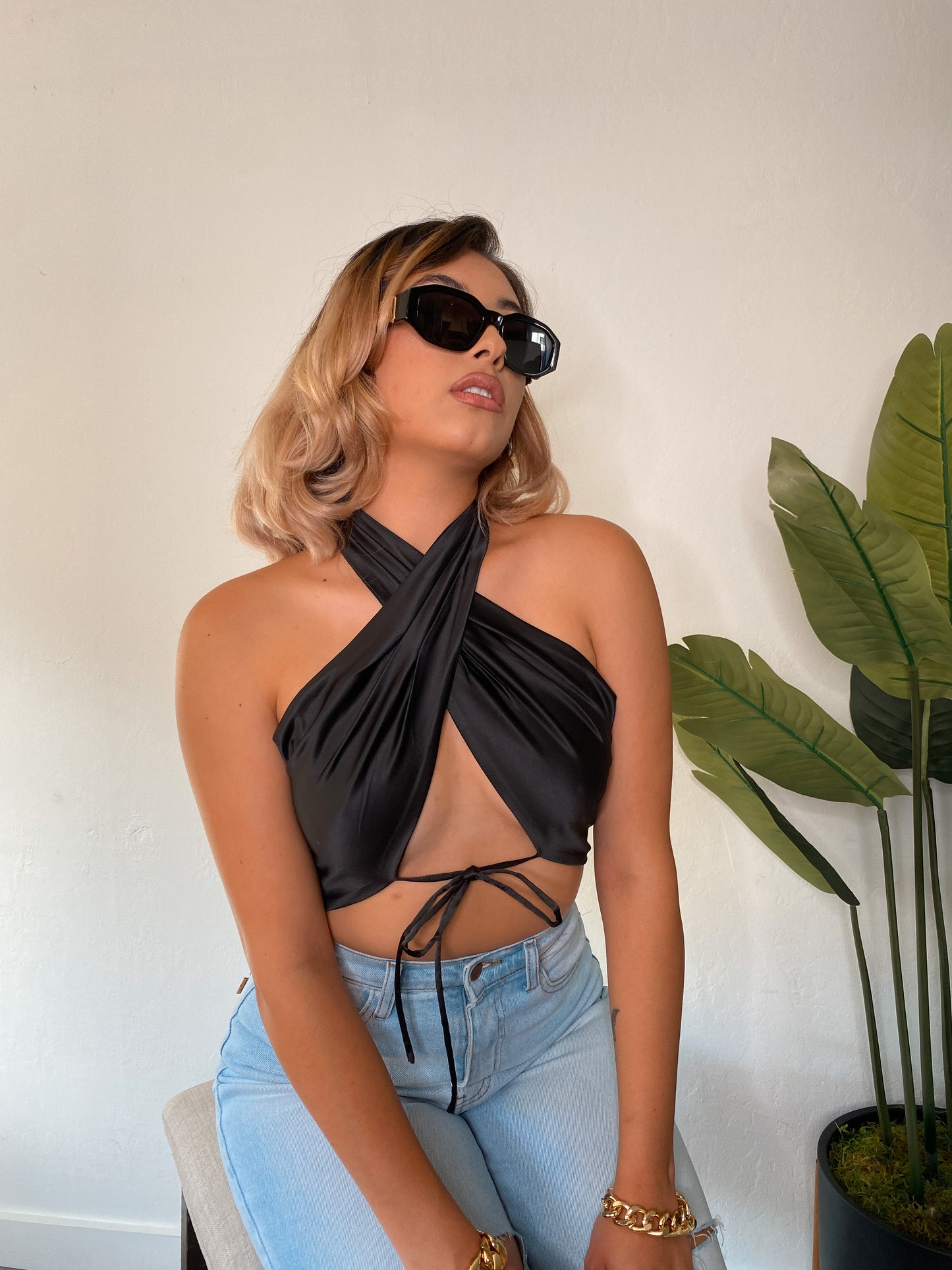 Elegant satin black halter crop top with tie neck detail