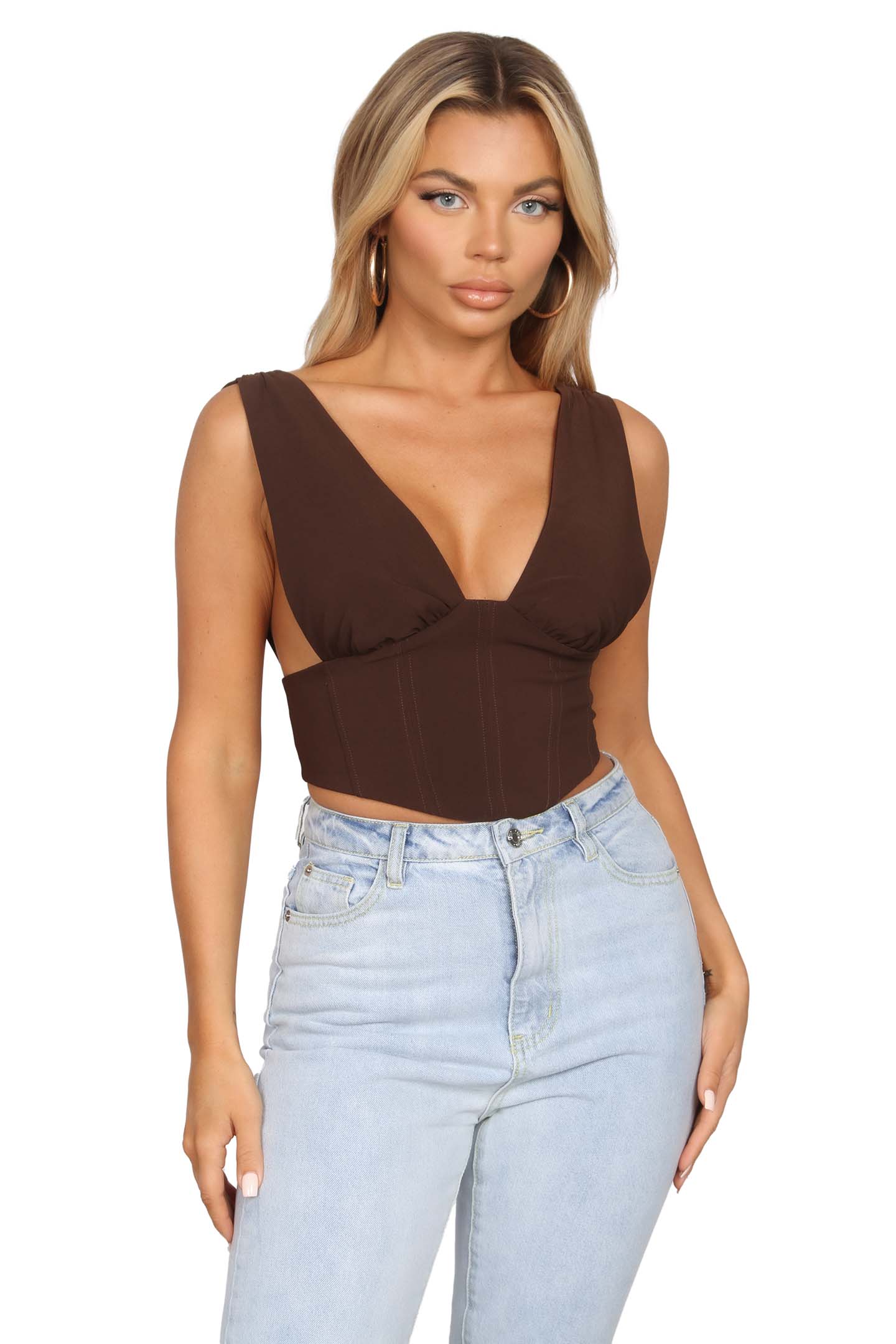 Model wearing the Canes Brown Crop Top, showcasing the deep V-neck plunge detail and stylish design.
